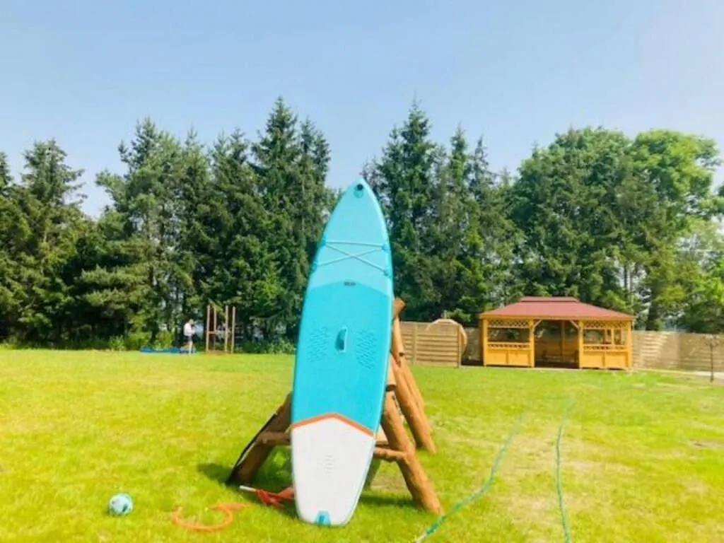 KALINOWY SAD DOMKI z JACUZZI i SAUNĄ MIKOŁAJKI  – Mikołajki, Polska